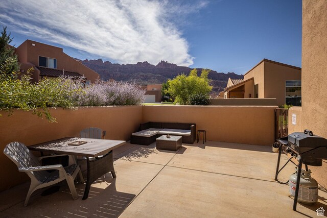 3686 S Spanish Valley Dr Unit U-3, Moab, UT 84532 - view of patio / terrace with a mountain view, a grill, and an outdoor fire pit