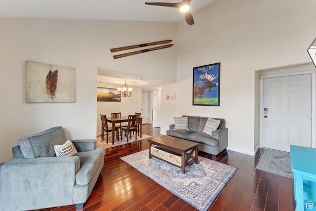 7035 N 2200 W Unit 3W, Park City, UT 84098 - living area featuring baseboards, high vaulted ceiling, dark wood-style flooring, and ceiling fan with notable chandelier