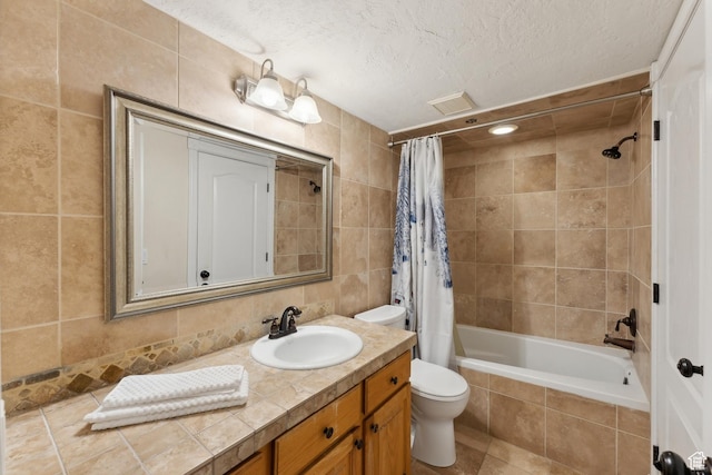 7035 N 2200 W Unit 3W, Park City, UT 84098 - full bath featuring toilet, a textured ceiling, tiled shower / bath combo, tile walls, and vanity