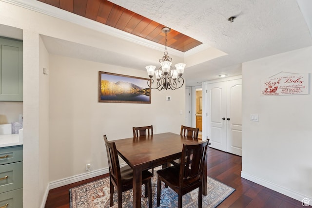 7035 N 2200 W Unit 3W, Park City, UT 84098 - dining room with an inviting chandelier, a raised ceiling, dark wood-style floors, and baseboards