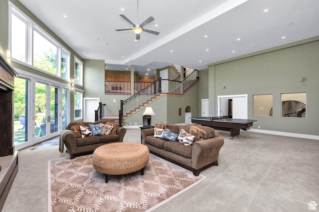 4127 E Mathews Way S, Salt Lake City, UT 84124 - living area with baseboards, a towering ceiling, stairs, billiards, and carpet floors