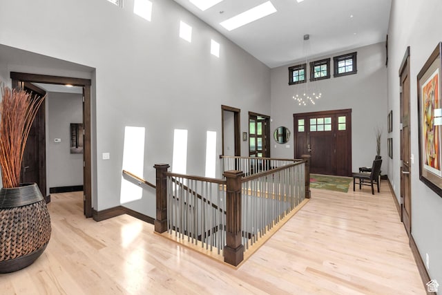 4127 E Mathews Way S, Salt Lake City, UT 84124 - foyer entrance featuring a towering ceiling, baseboards, and wood finished floors