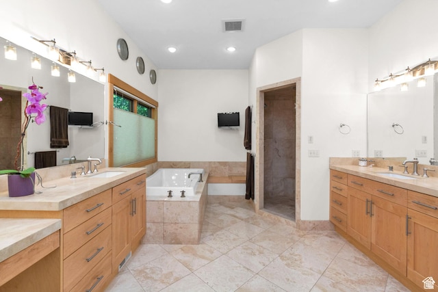 4127 E Mathews Way S, Salt Lake City, UT 84124 - full bath with a garden tub, a sink, visible vents, and tiled shower