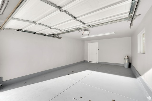 2745 E 3100 S, Millcreek, UT 84109 - garage with a garage door opener and baseboards