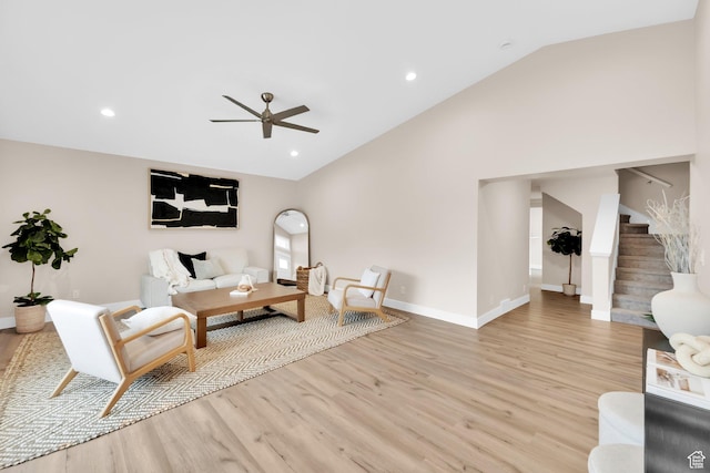 living area featuring wood finished floors, recessed lighting, stairway, baseboards, and ceiling fan