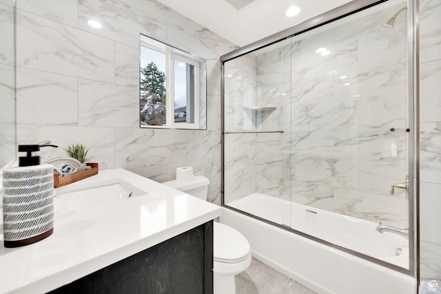 2745 E 3100 S, Millcreek, UT 84109 - full bathroom featuring vanity, recessed lighting, tile walls, toilet, and combined bath / shower with glass door
