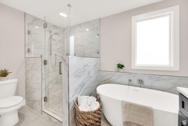2745 E 3100 S, Millcreek, UT 84109 - bathroom featuring vanity, a freestanding tub, toilet, and a marble finish shower