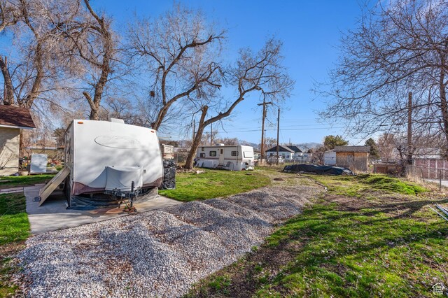 909 S Concord St, Salt Lake City, UT 84104 - view of yard featuring fence
