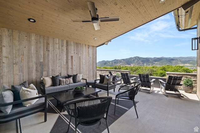 11503 N Soaring Hawk Ln, Hideout, UT 84036 - view of patio featuring an outdoor hangout area, a mountain view, and a ceiling fan