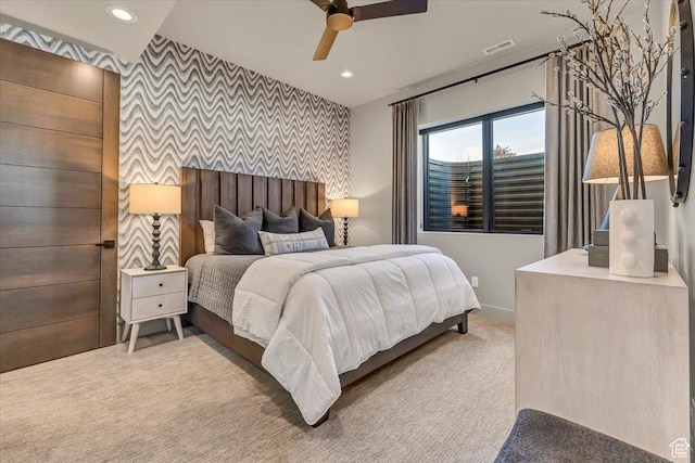 11503 N Soaring Hawk Ln, Hideout, UT 84036 - carpeted bedroom featuring an accent wall, wallpapered walls, recessed lighting, and ceiling fan