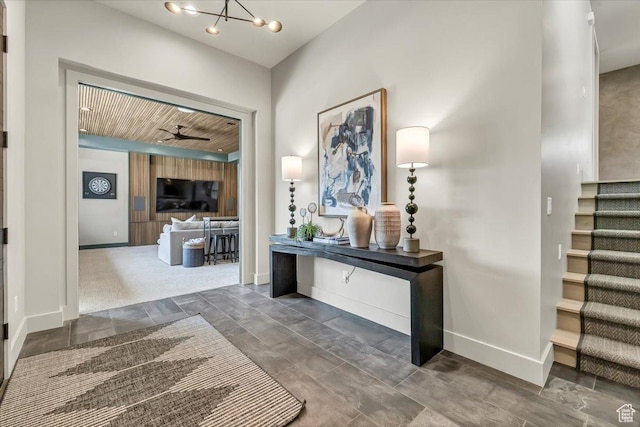 11503 N Soaring Hawk Ln, Hideout, UT 84036 - hall featuring stairs and a chandelier