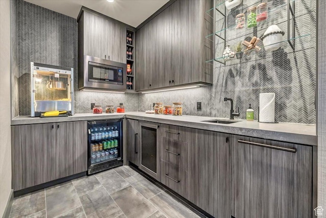 11503 N Soaring Hawk Ln, Hideout, UT 84036 - indoor bar featuring stainless steel microwave, wine cooler, and backsplash