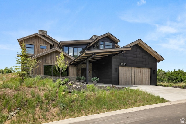 11503 N Soaring Hawk Ln, Hideout, UT 84036 - view of front of house featuring concrete driveway and a chimney