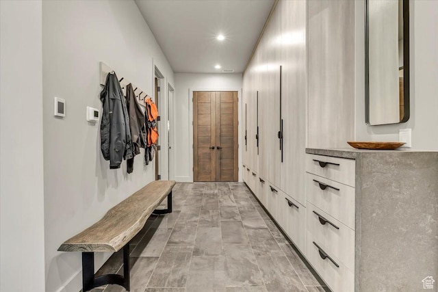 11503 N Soaring Hawk Ln, Hideout, UT 84036 - mudroom featuring recessed lighting and baseboards
