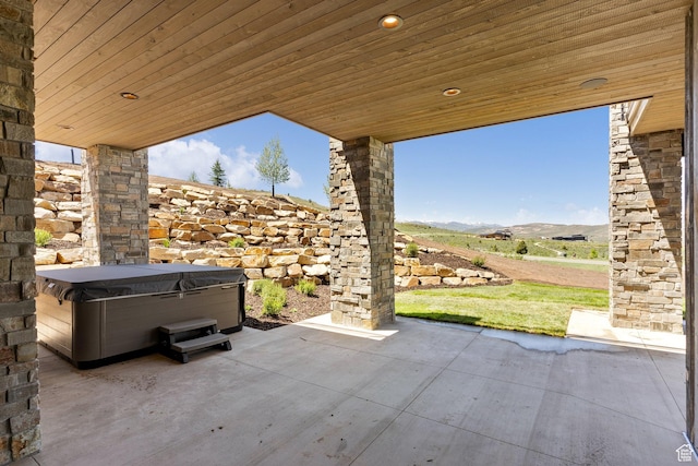 6421 E Evening Star Dr, Kamas, UT 84036 - view of patio / terrace featuring a mountain view and a hot tub