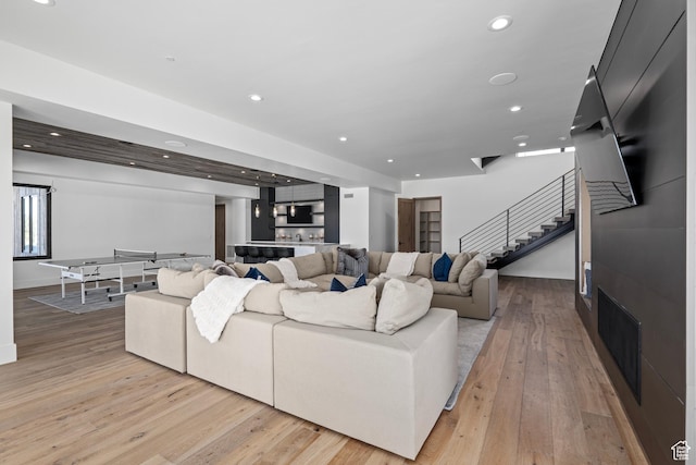 6421 E Evening Star Dr, Kamas, UT 84036 - living room featuring recessed lighting, stairs, and light wood finished floors
