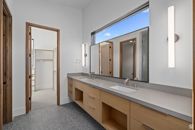 6421 E Evening Star Dr, Kamas, UT 84036 - full bathroom featuring double vanity, a closet, baseboards, and a sink