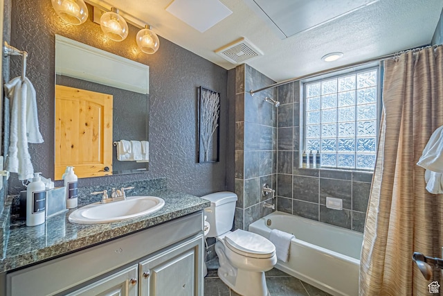 2669 Canyons Resort Dr Unit 314, Park City, UT 84098 - bathroom featuring vanity, shower / bathtub combination with curtain, visible vents, a textured ceiling, and a textured wall