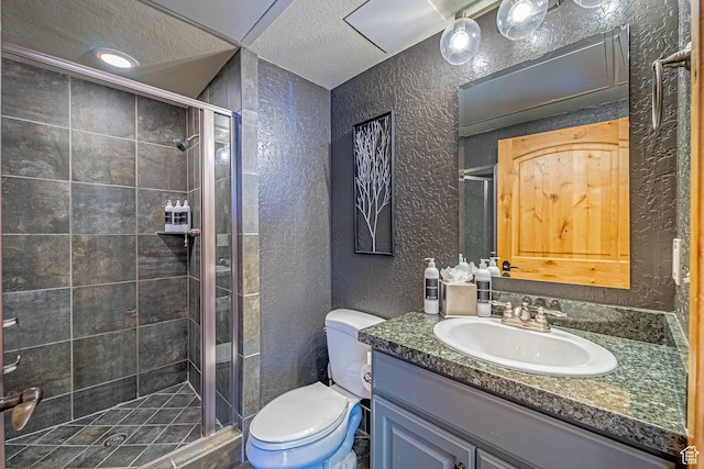2669 Canyons Resort Dr Unit 314, Park City, UT 84098 - full bathroom with vanity, toilet, a shower stall, and a textured wall