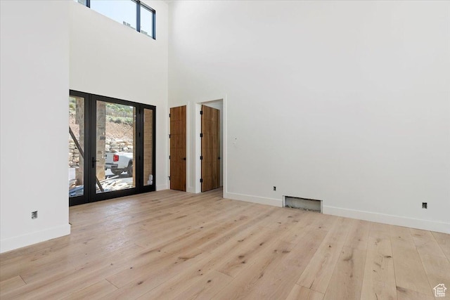 1878 E Chimney Rock Rd S Unit 536, Heber City, UT 84032 - foyer with baseboards, hardwood / wood-style flooring, and a towering ceiling