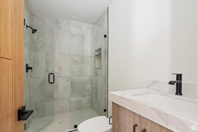 1878 E Chimney Rock Rd S Unit 536, Heber City, UT 84032 - bathroom featuring a stall shower, vanity, and toilet