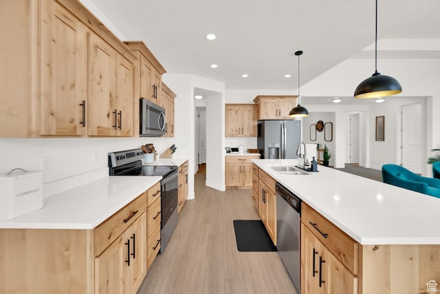 2998 E 80 S, Spanish Fork, UT 84660 - kitchen with light wood-type flooring, a sink, appliances with stainless steel finishes, and light brown cabinetry
