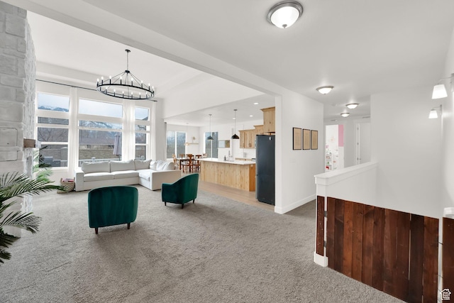 2998 E 80 S, Spanish Fork, UT 84660 - living area with baseboards, a notable chandelier, and carpet