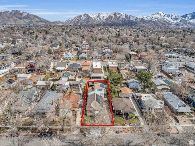 aerial view with a mountain view and a residential view