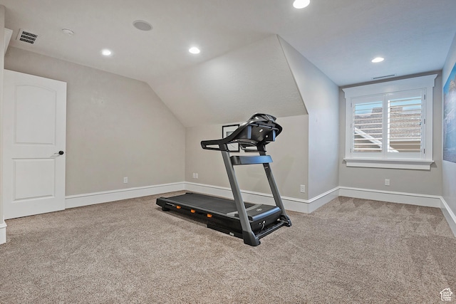 exercise area with carpet floors, baseboards, vaulted ceiling, and recessed lighting