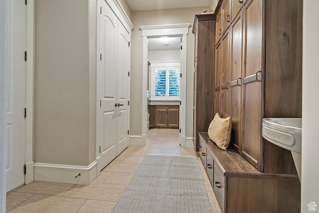 mudroom featuring light tile patterned floors