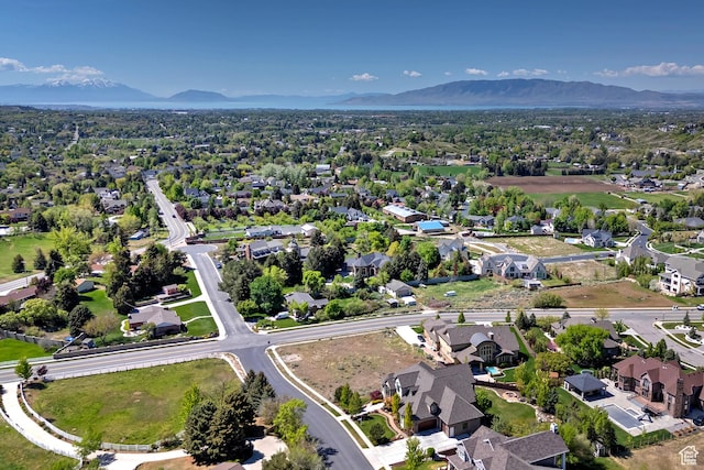 aerial view of residential area with mountains