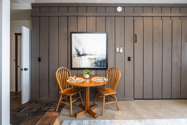 1385 Lowell Ave Unit 101, Park City, UT 84060 - dining area featuring stone finish floor and wood walls