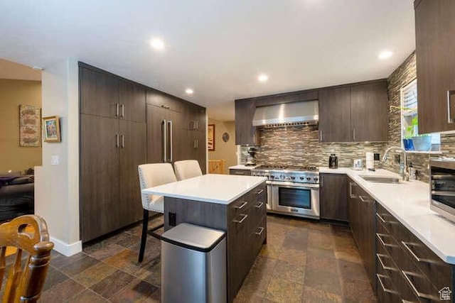 1689 E Kierstin Pl, Salt Lake City, UT 84108 - kitchen with stainless steel stove, wall chimney exhaust hood, stone tile flooring, and a sink