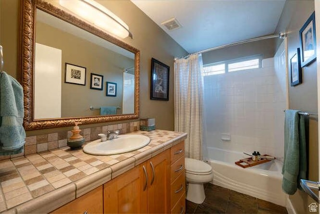 1689 E Kierstin Pl, Salt Lake City, UT 84108 - bathroom featuring vanity, visible vents, shower / bath combination with curtain, tile patterned floors, and toilet