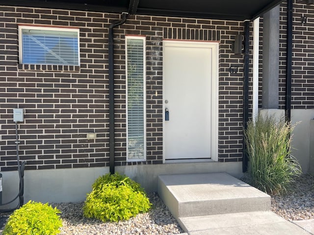 67 E Hamblin Ln, Clearfield, UT 84015 - property entrance featuring brick siding