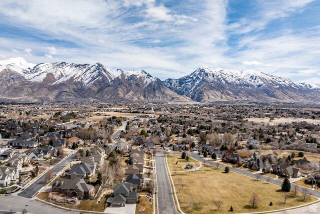 drone / aerial view with a mountain view and a residential view