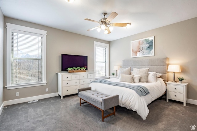 bedroom featuring visible vents, baseboards, carpet, and ceiling fan