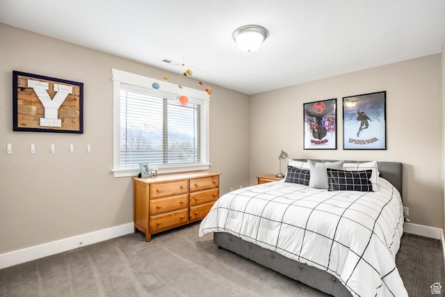 bedroom featuring light colored carpet, baseboards, and visible vents