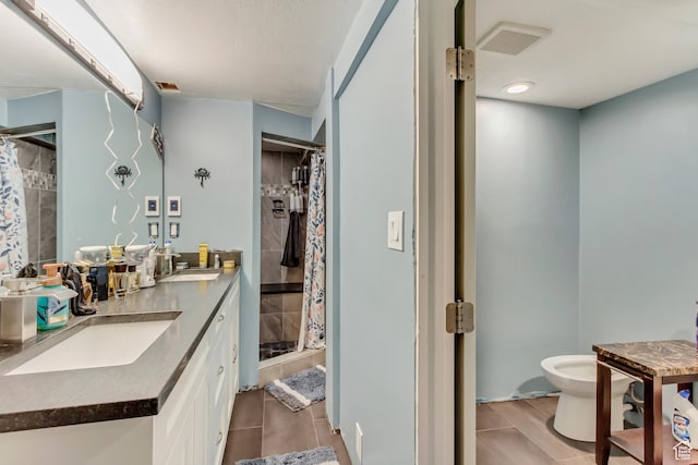6259 S 340 E, Murray, UT 84107 - full bathroom featuring double vanity, visible vents, a shower stall, and a sink