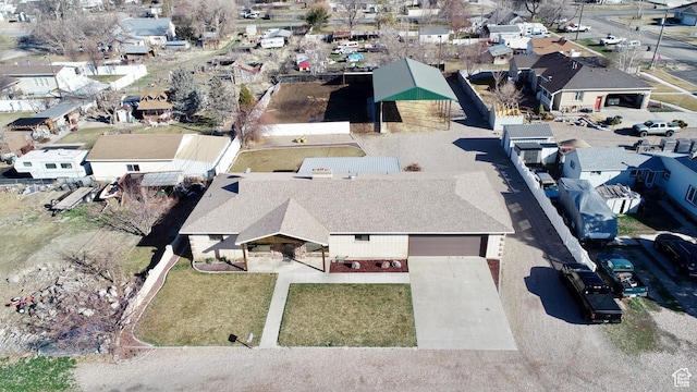 birds eye view of property with a residential view