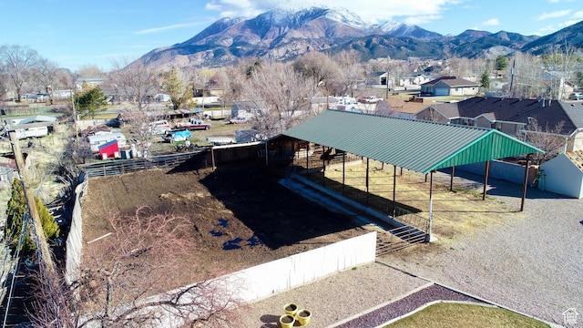 birds eye view of property featuring a mountain view and a residential view