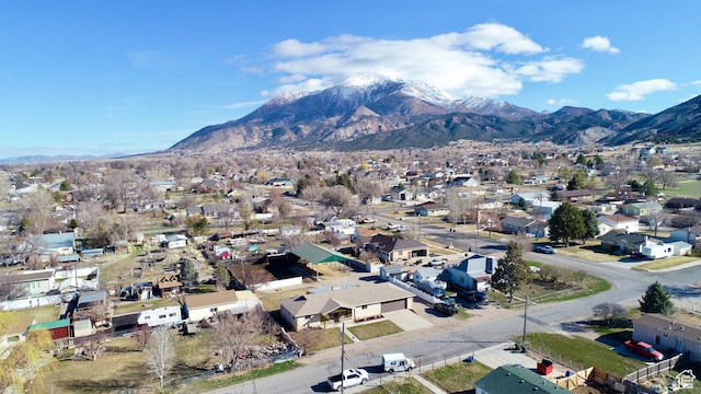 drone / aerial view with a mountain view and a residential view