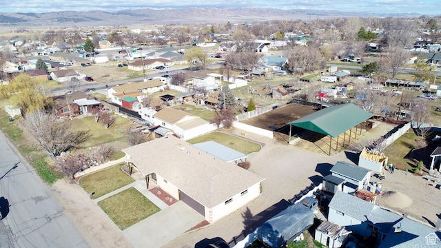 bird's eye view featuring a mountain view and a residential view