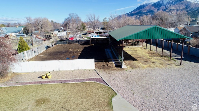 drone / aerial view featuring a mountain view