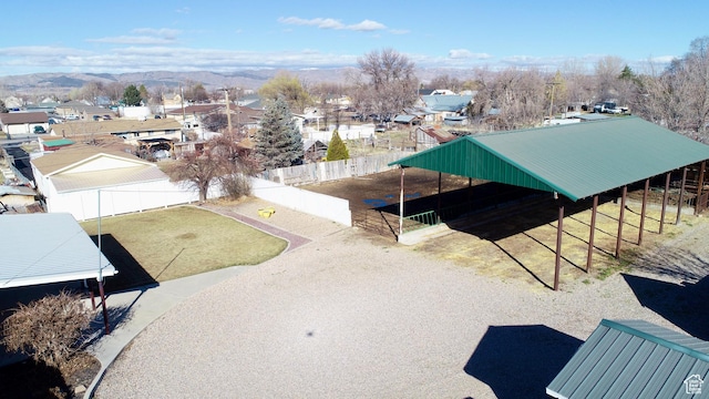 drone / aerial view with a mountain view and a residential view