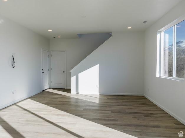 1114 W 450 S Unit 62, Brigham City, UT 84302 - empty room with wood finished floors, recessed lighting, and baseboards