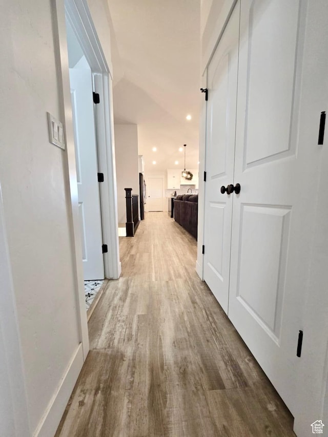 9480 N 5600 W, Elwood, UT 84337 - corridor featuring baseboards, recessed lighting, and wood finished floors