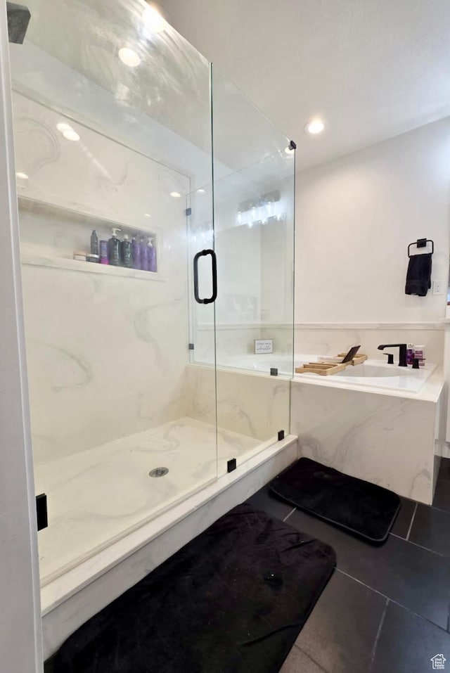 9480 N 5600 W, Elwood, UT 84337 - bathroom with recessed lighting, tile patterned flooring, a bath, and a marble finish shower