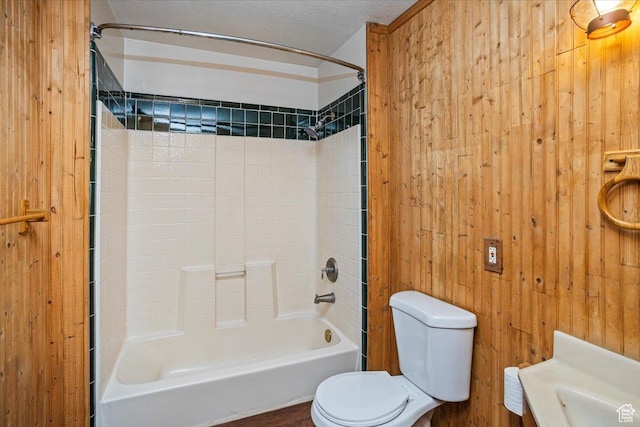 3356 W 1200 S, Ogden, UT 84404 - bathroom with wooden walls, shower / bath combination, and toilet