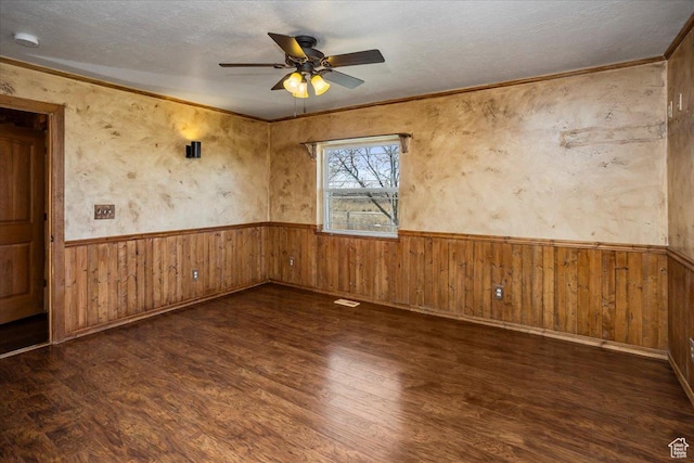 3356 W 1200 S, Ogden, UT 84404 - empty room with a wainscoted wall, wood walls, wood finished floors, ceiling fan, and ornamental molding